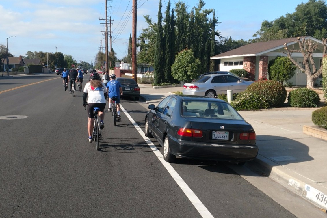 Cars parked in a "flex" bike lane on South Cambridge Street. Cars are not allowed to park on the bike lane between 7am-9am, the photo was taken 8 a.m.