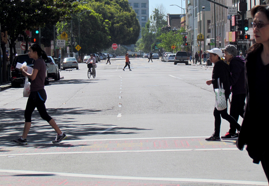 It was all-pedestrian-scramble all the time in Oakland's Chinatown, where on a usual Thursday getting through here means crossing through a nightmare phalanx of cars and trucks.