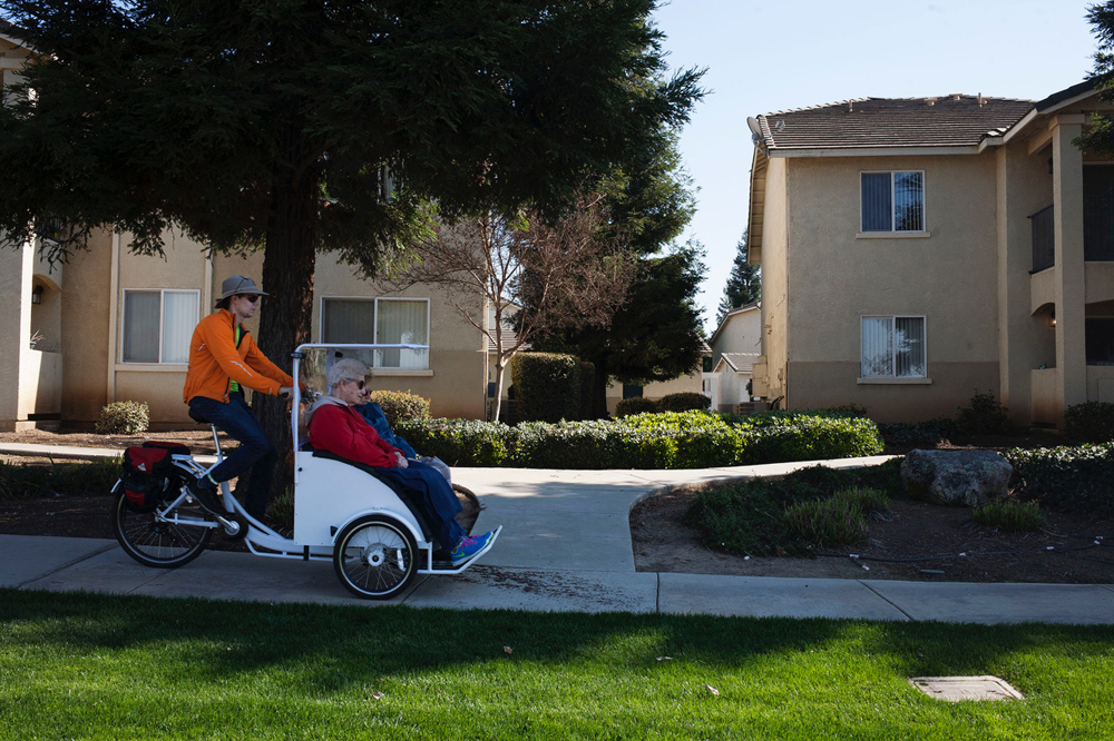 Mills Ewing, a member of the Merced Bicycle Coalition, chauffeurs during the bike club’s inaugural pedi-cab project ride. Hicks and other members of the club plan to take seniors on rides once a month as part of the project