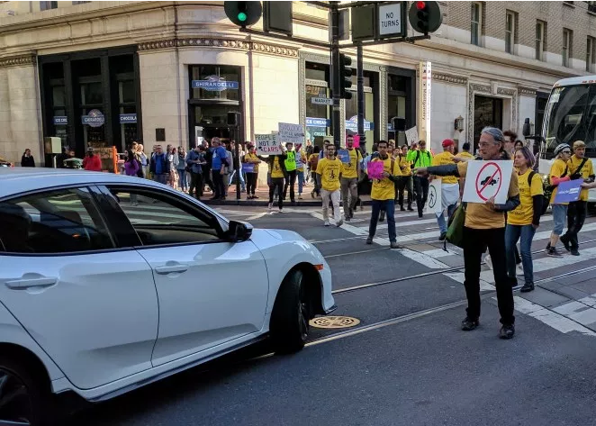 Protesters Demand an End to Private Cars Jamming Market
