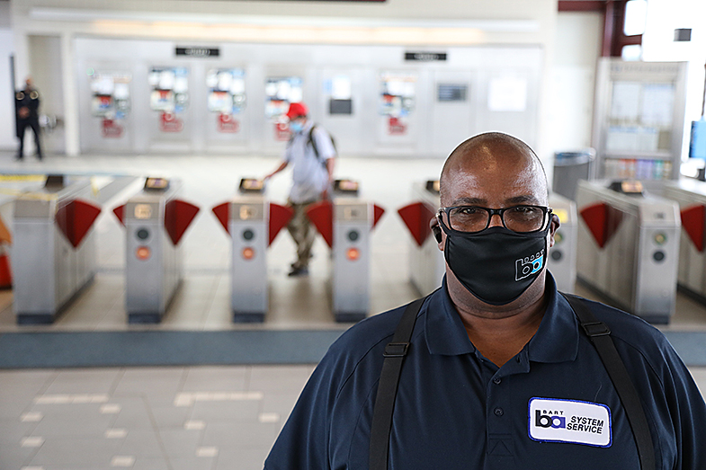 Bart worker wearing a mask