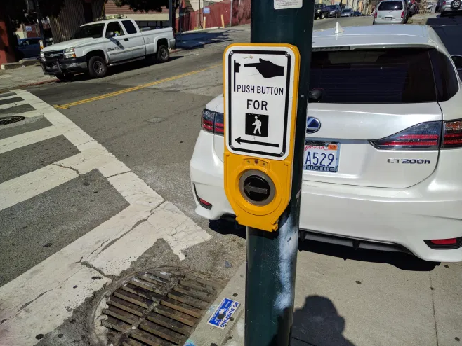 Advocate Urges Removal of S.F.’s “Beg Buttons”