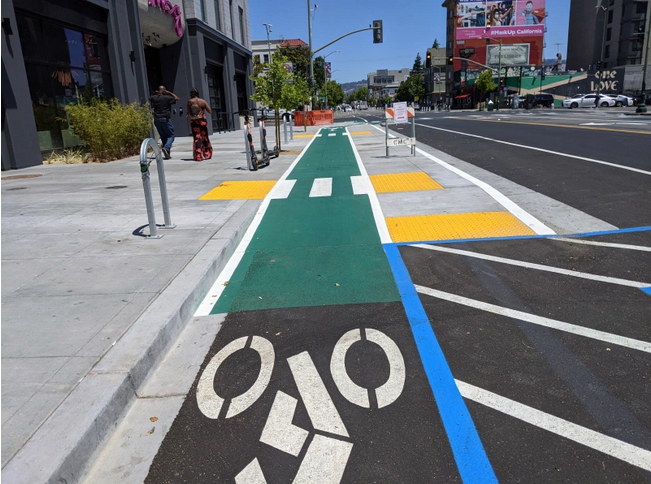 New concrete bus boarding island on Telegraph ave. Photo by Roger Rudick/Streetsblog