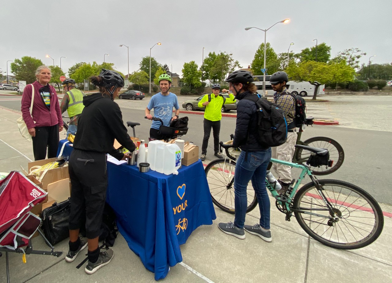 In Berkeley, volunteers give out goodies at the Ashby BART station. Photo by Melanie Curry/Streetsblog